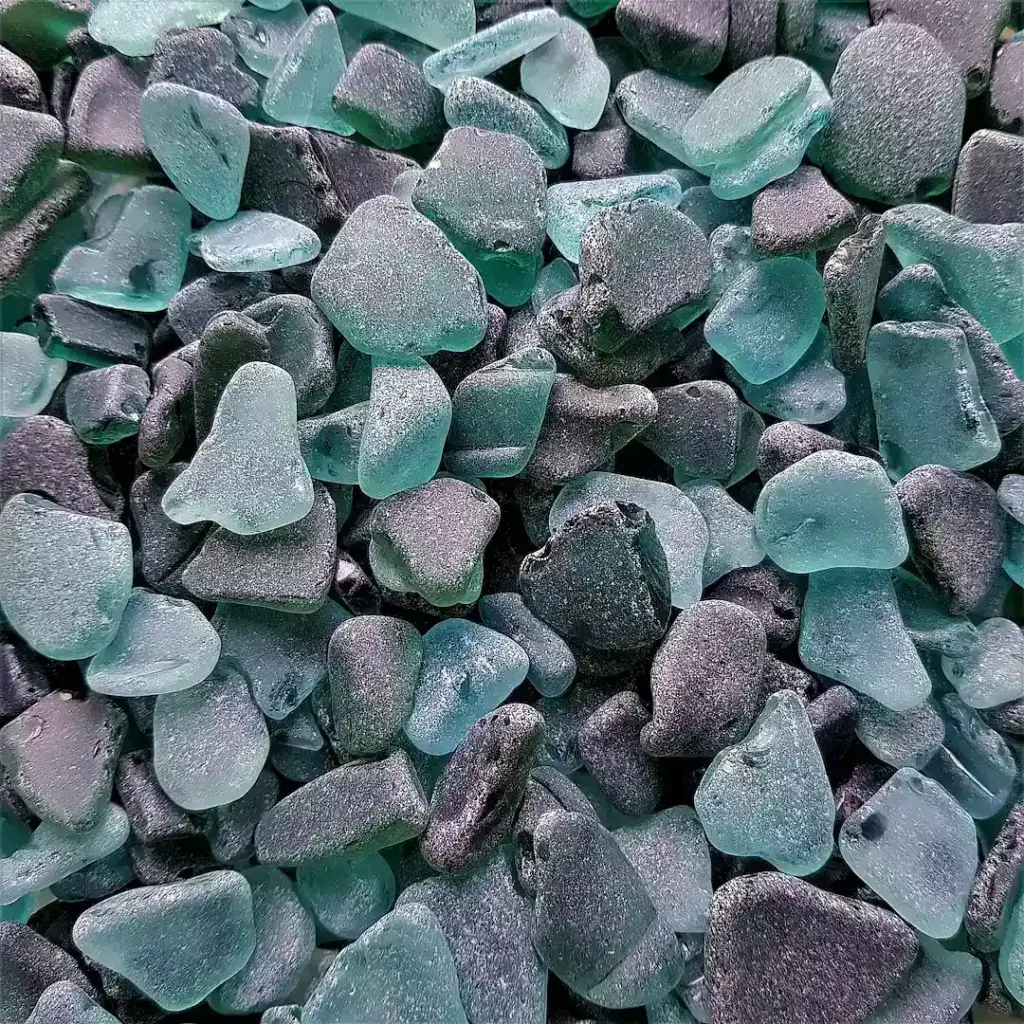 A gorgeous display of small seaglass pieces of teal color
