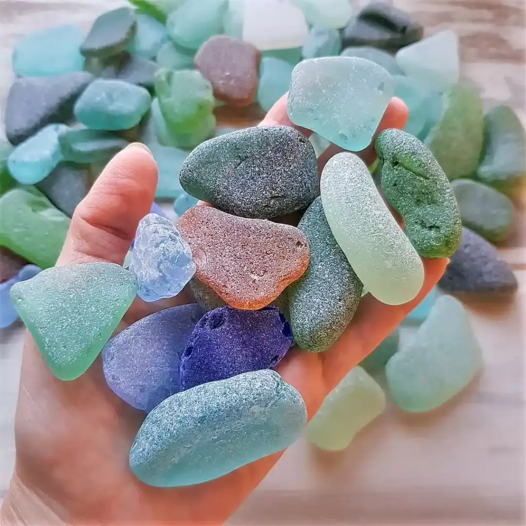 Handful of sea glass pieces displayed for decoration and crafting.