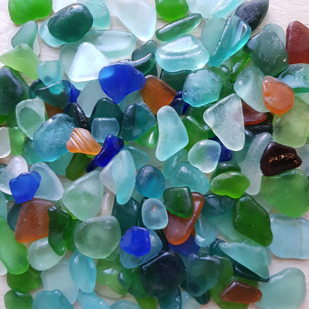 Real sea glass. A beautifully colored mix:Unique natural element, perfect for home decor adding charm to a coastal style