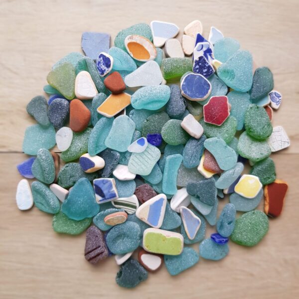 Real ocean sea glass and pottery pieces. It's a unique natural material, perfect for home decor and adding unparalleled charm to a coastal style.