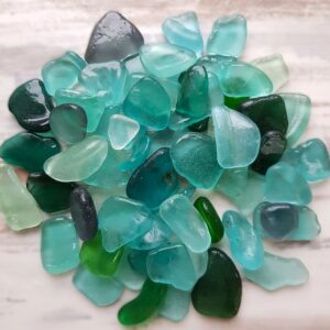 Well-aged wet sea glass in aqua, sea foam, and teal colors.