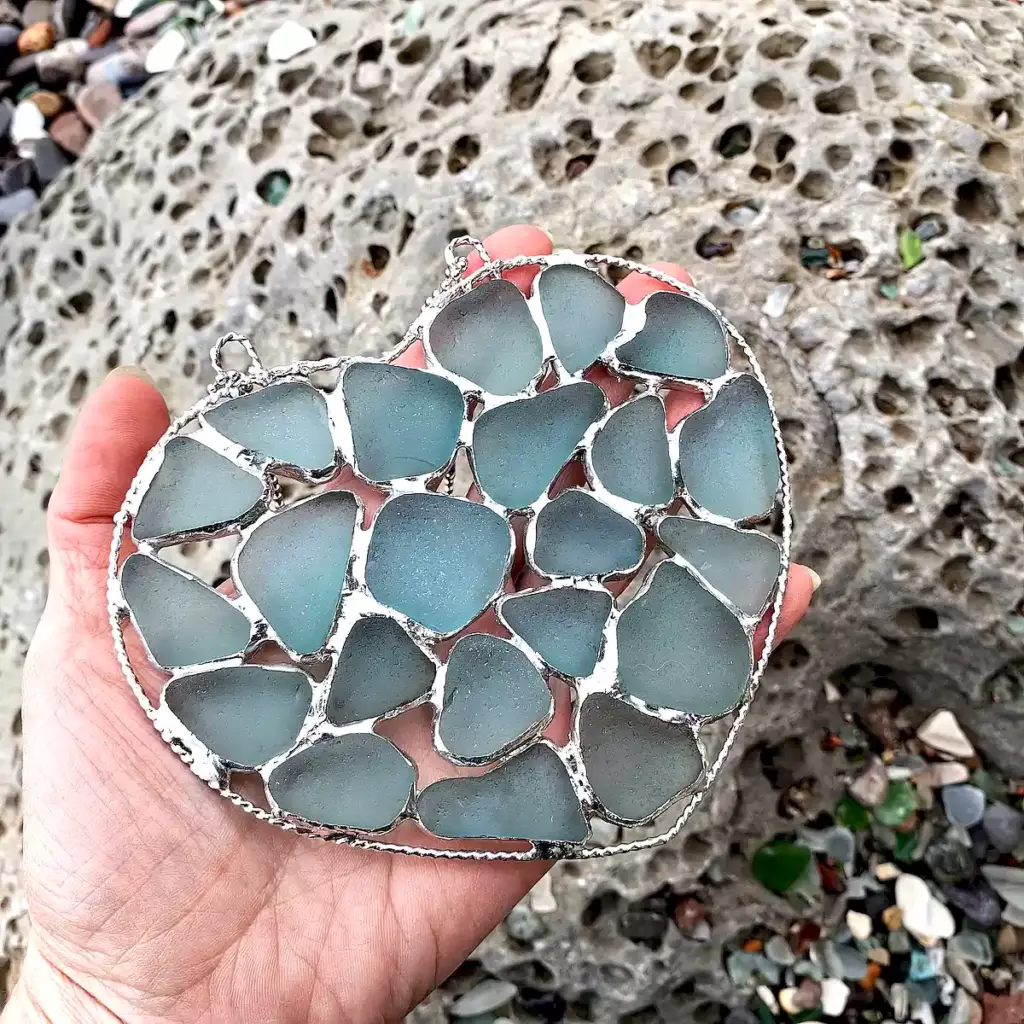 Stained Sea Glass Suncatcher displayed on a hand