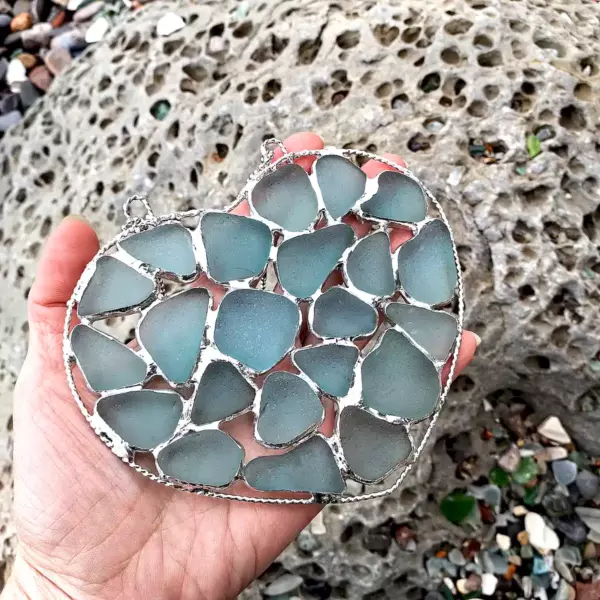 Stained Sea Glass Suncatcher displayed on a hand