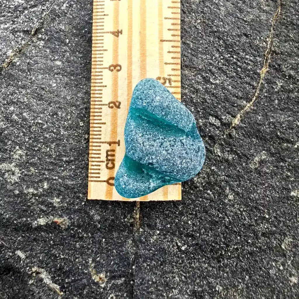 Textured Teal Sea Glass on a ruler