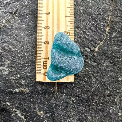 Textured Teal Sea Glass on a ruler
