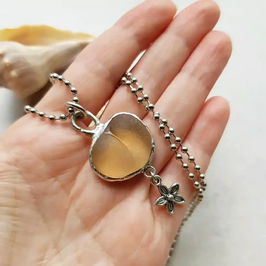 Peach Sea Glass Charm Necklace with flower charm