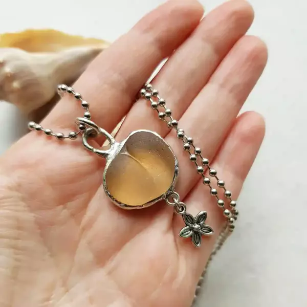 Peach Sea Glass Charm Necklace with flower charm