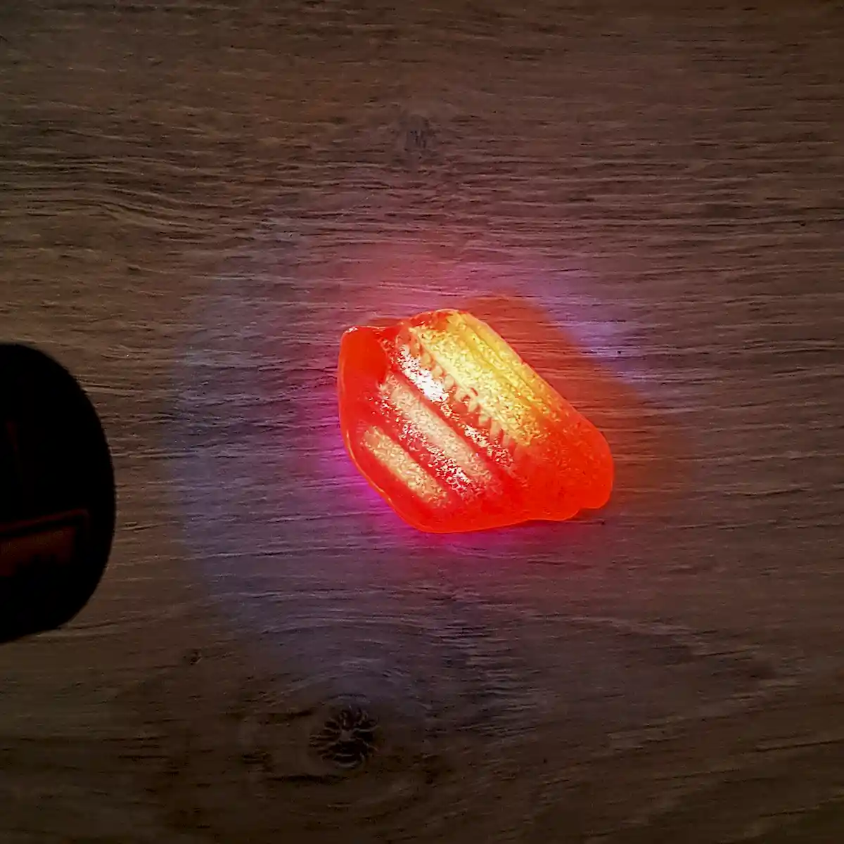 Yellow sea glass under UV light