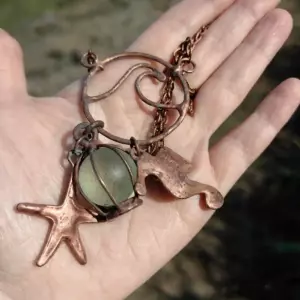 Patinated Sirencore Pendant with a Codd Marble and Seahorse & Starfish OOAK Charms