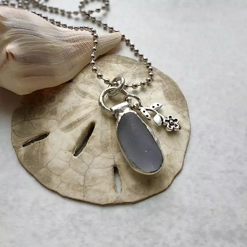 Minimalist grey sea glass necklace with flower charm - Japan sea glass