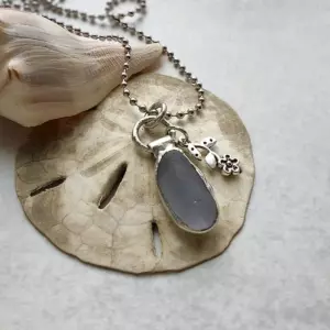 Minimalist grey sea glass necklace with flower charm - Japan sea glass