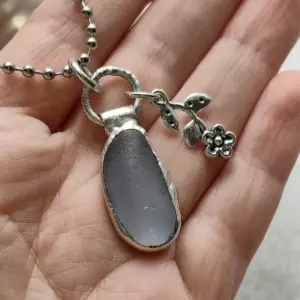 Minimalist grey sea glass necklace with flower charm - Japan sea glass
