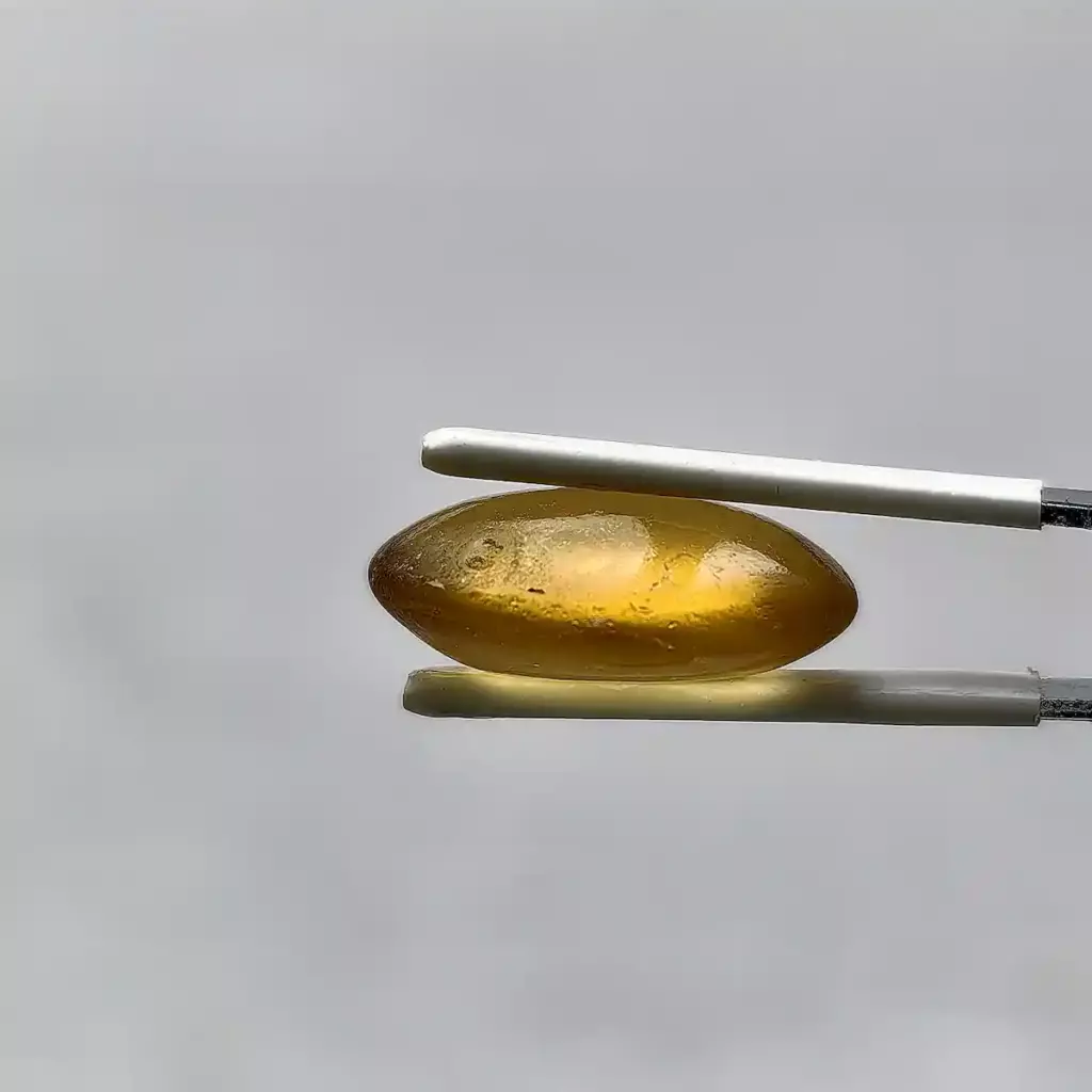 Honey sea glass gem side view