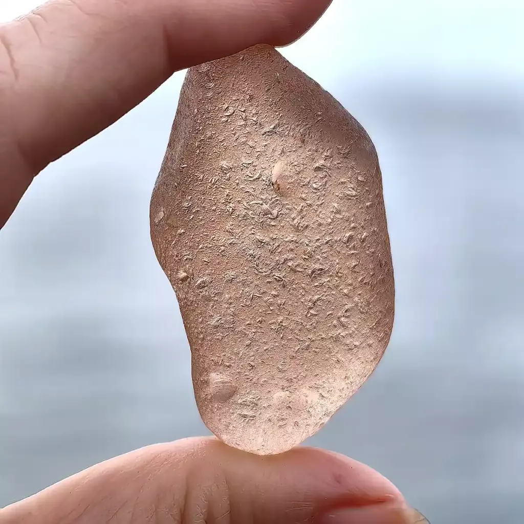 Authentic pink sea glass with c-marks