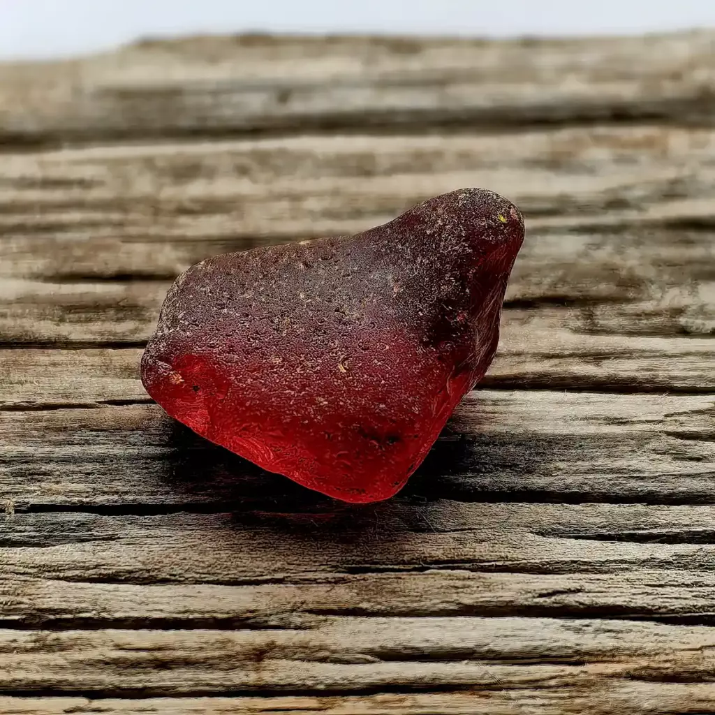 Genuine thick red sea glass