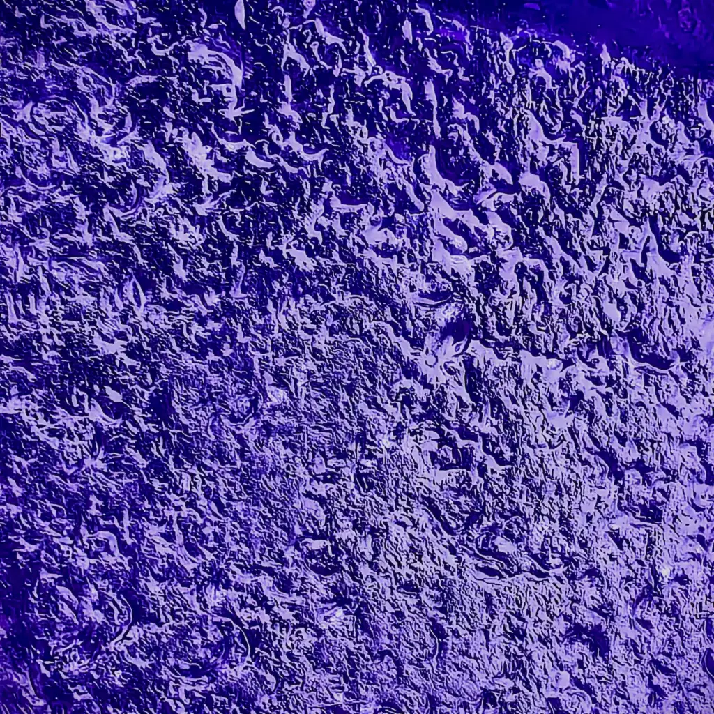 Macro view of genuine cobalt blue sea glass with c-marks
